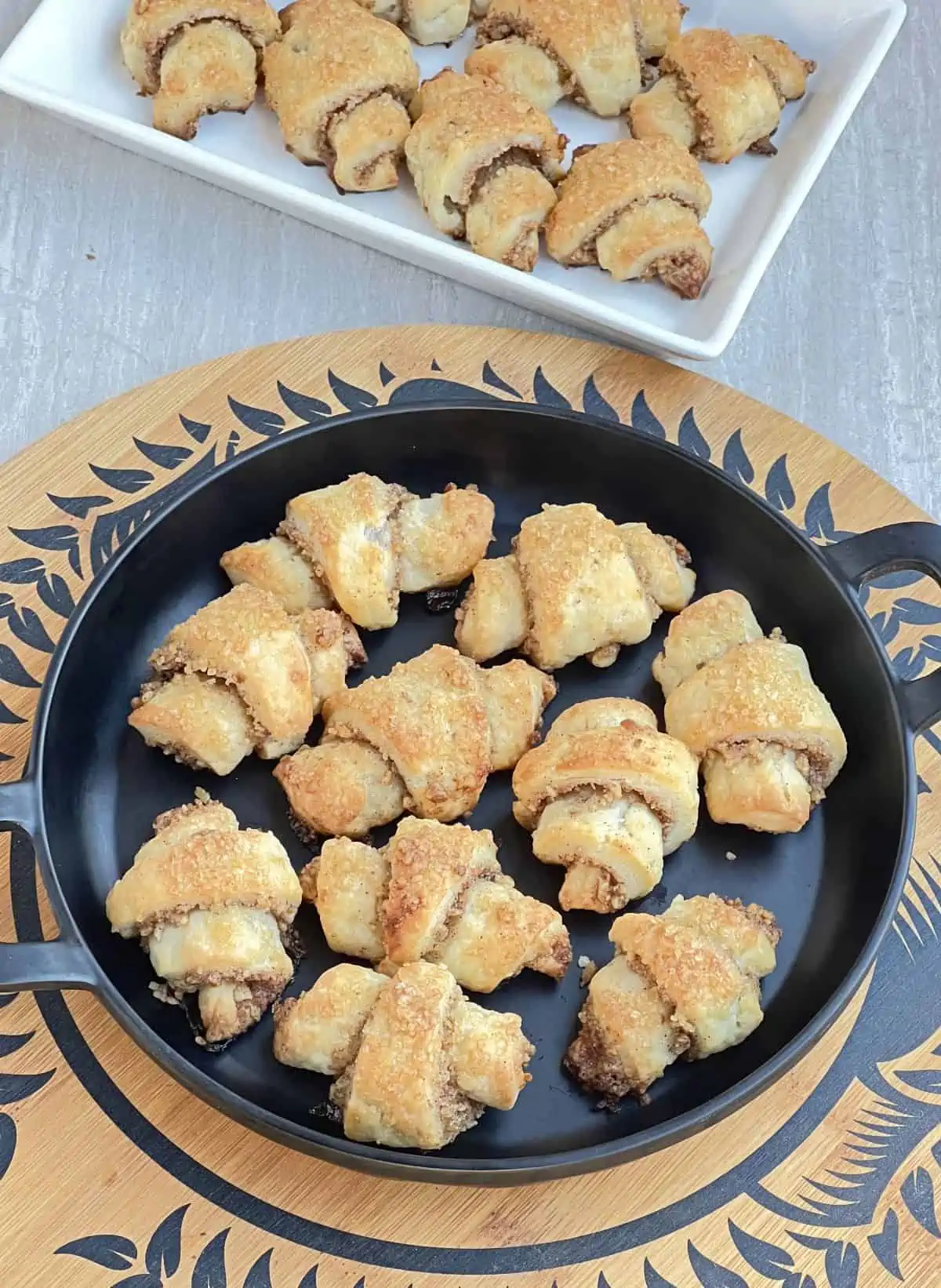 cream cheese spirals arranged in a black plate