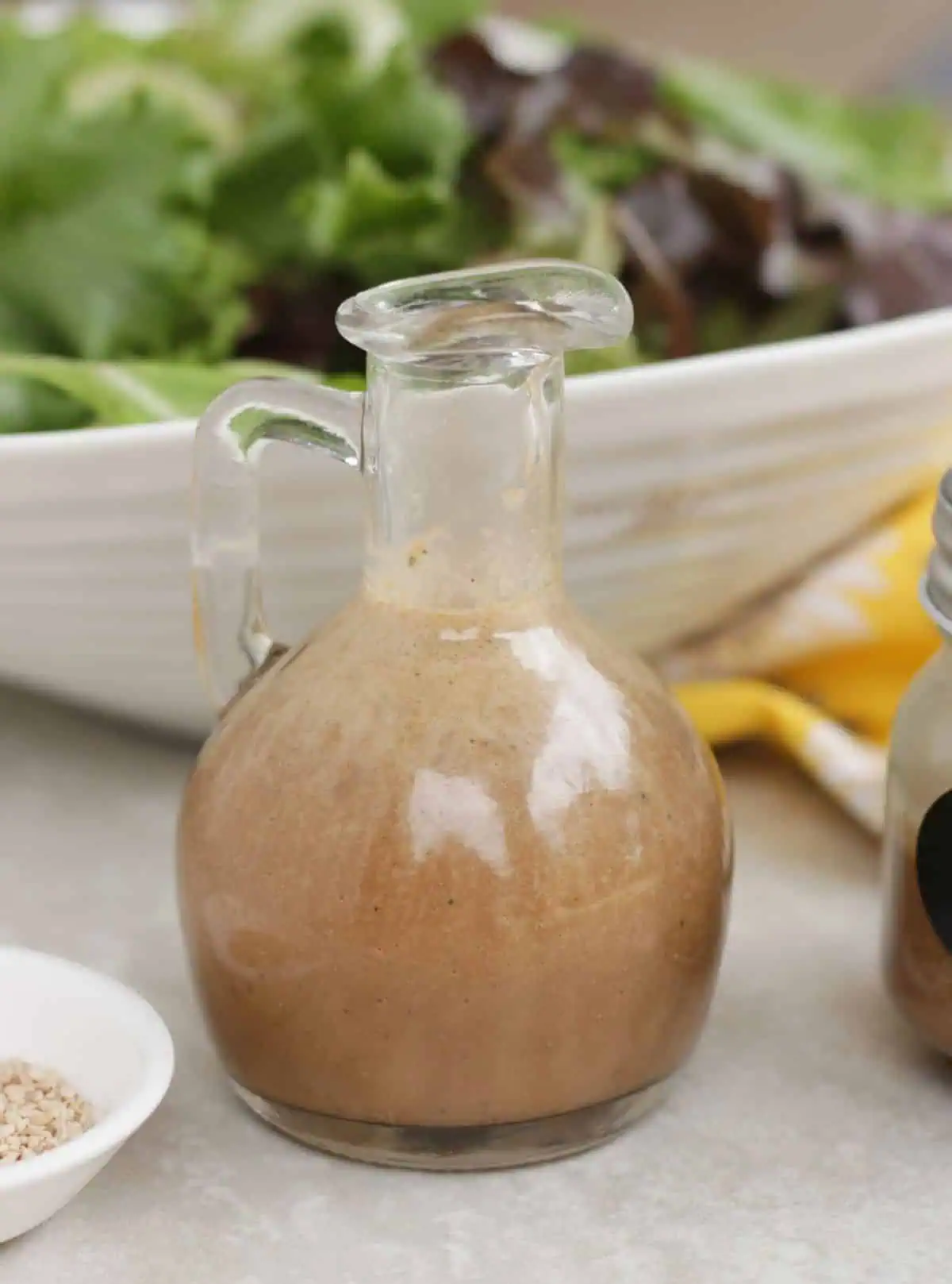 Miso salad dressing in a glass jar. 