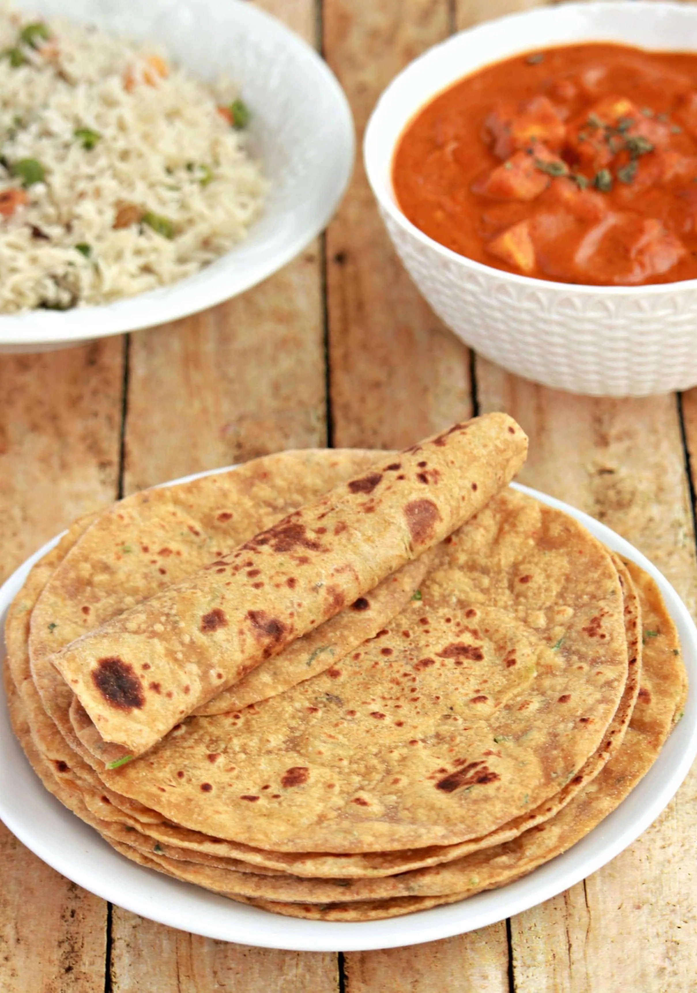 Avocado Flatbread with pulao and subzi in the background