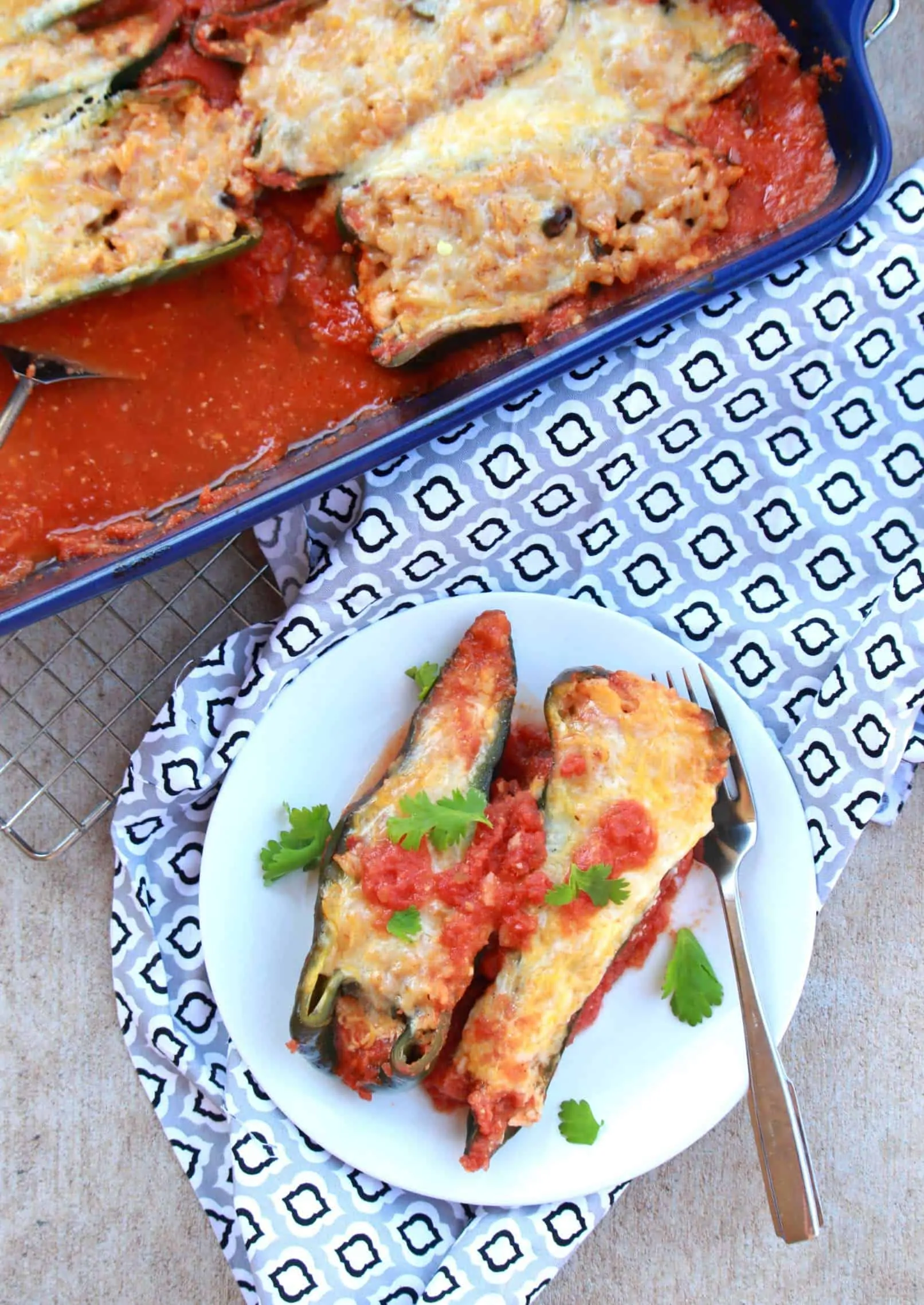 stuffed poblano from top view with a fork