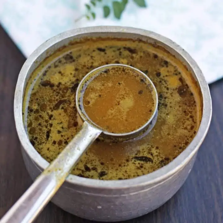 rasam with ladle