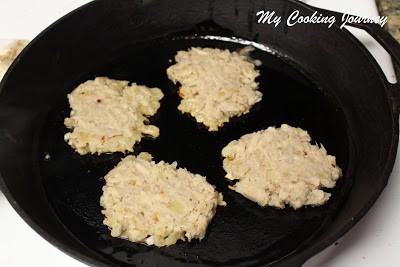 Cooking Latke in a skillet.