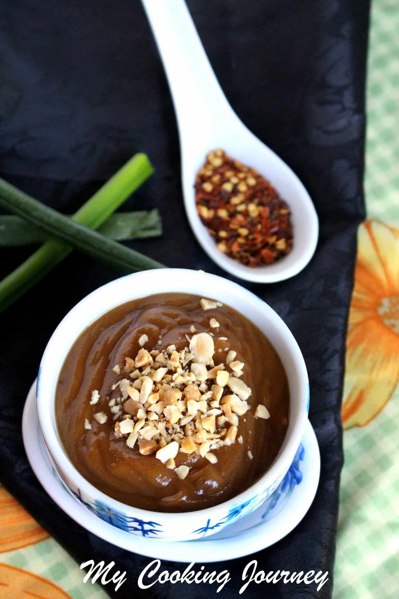 Spicy Peanut sauce  with crushed peanuts