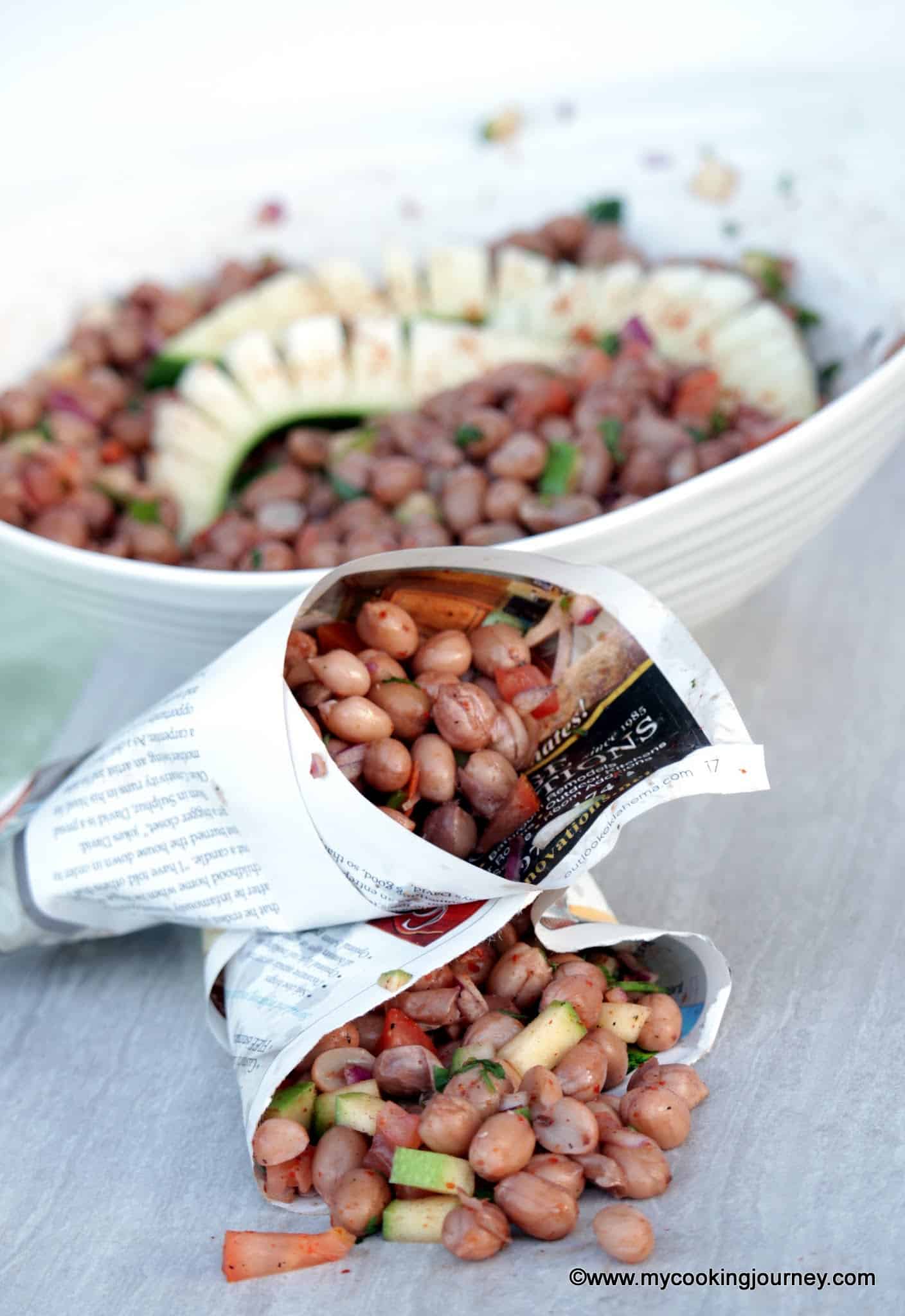 Masala Peanuts in cone and a bowl in the background