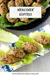 Kofte arranged on lettuce with toothpick.