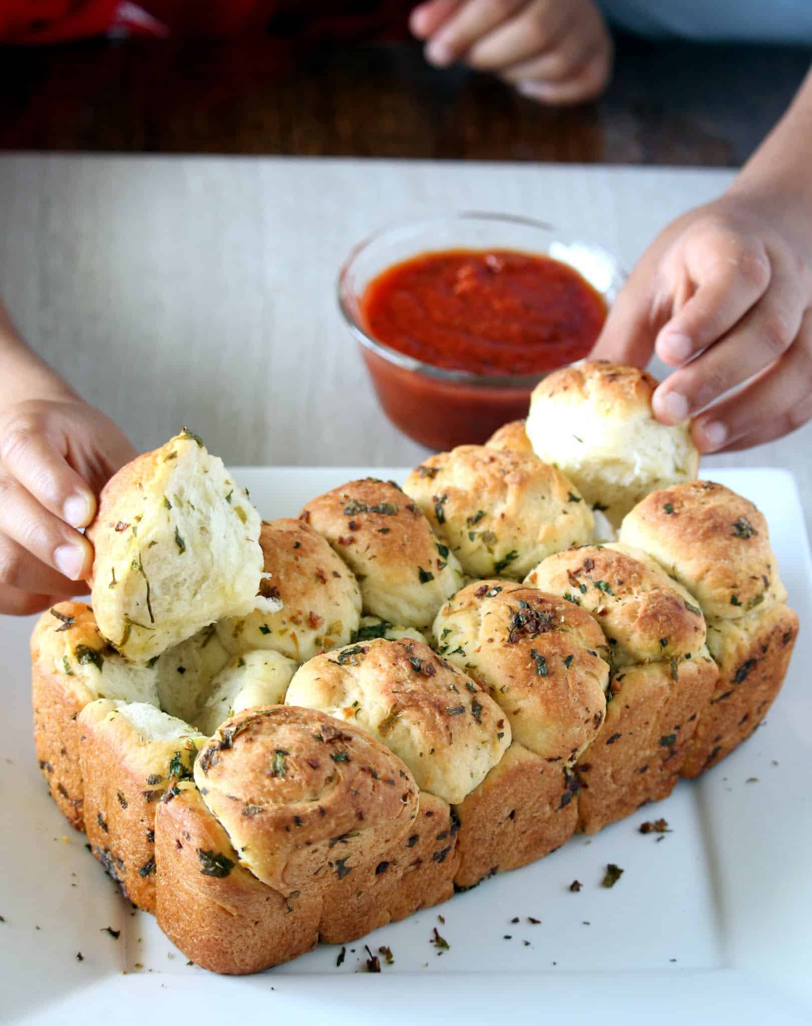 Pull apart Garlic Bread with a slice pulled apart