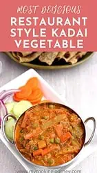 Kadai vegetable subzi in a bowl with salad on the side.