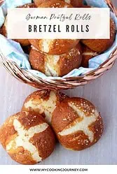 German Pretzel Rolls layered in a basket with text overlay for Pinterest.