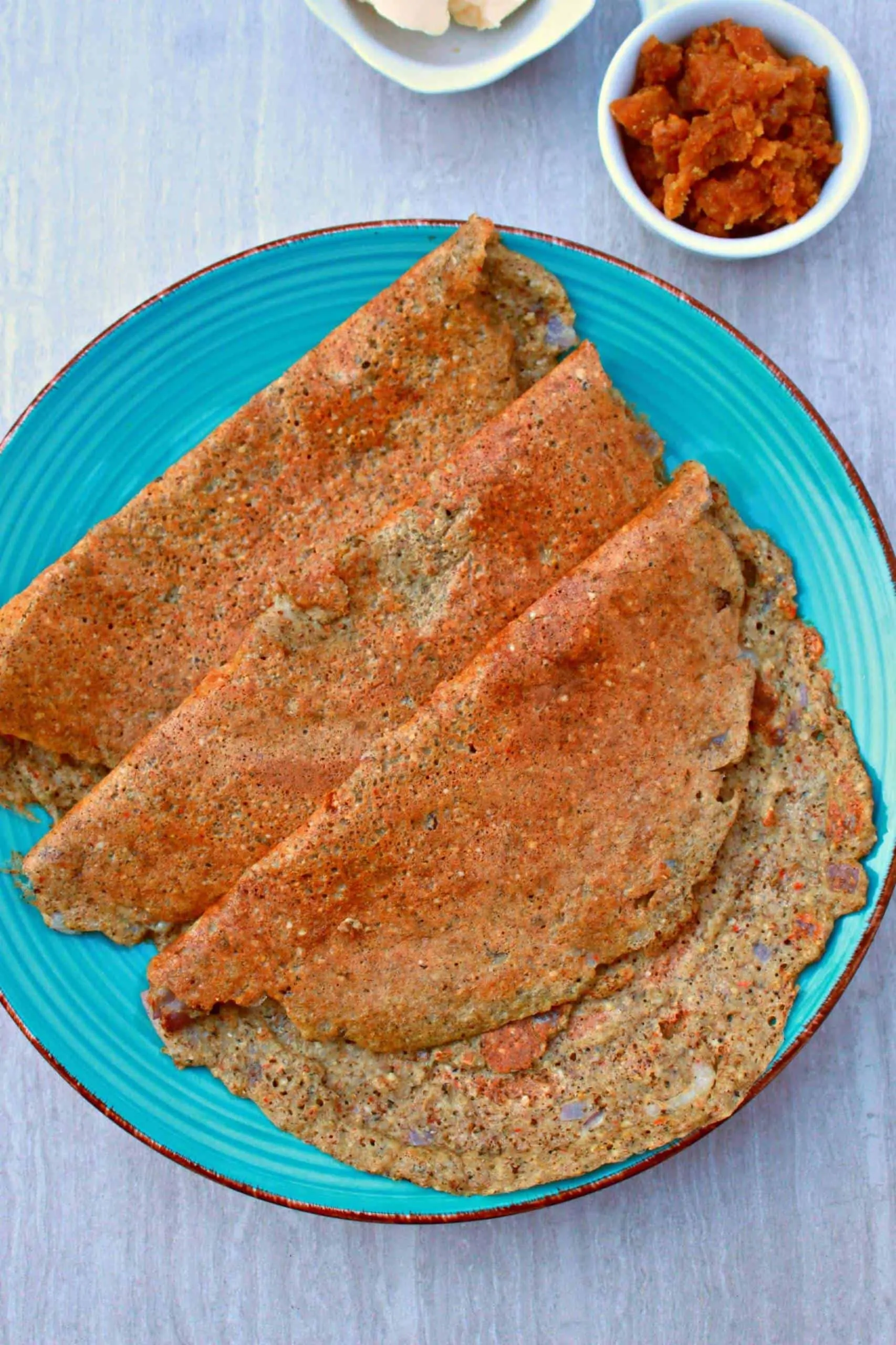 Quinoa Brown Rice Adai layered on a blue plate