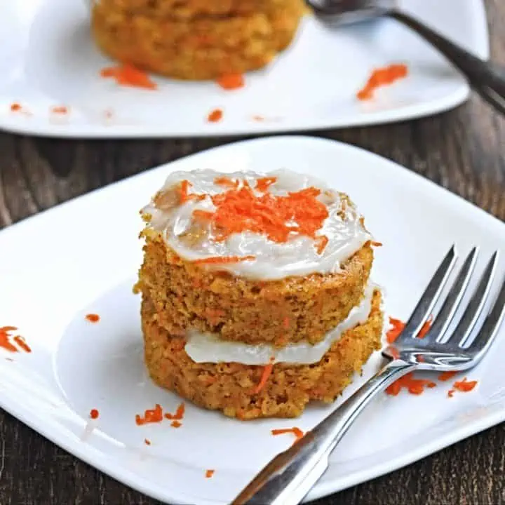 single serve microwave carrot mug cake with cream cheese frosting and fork