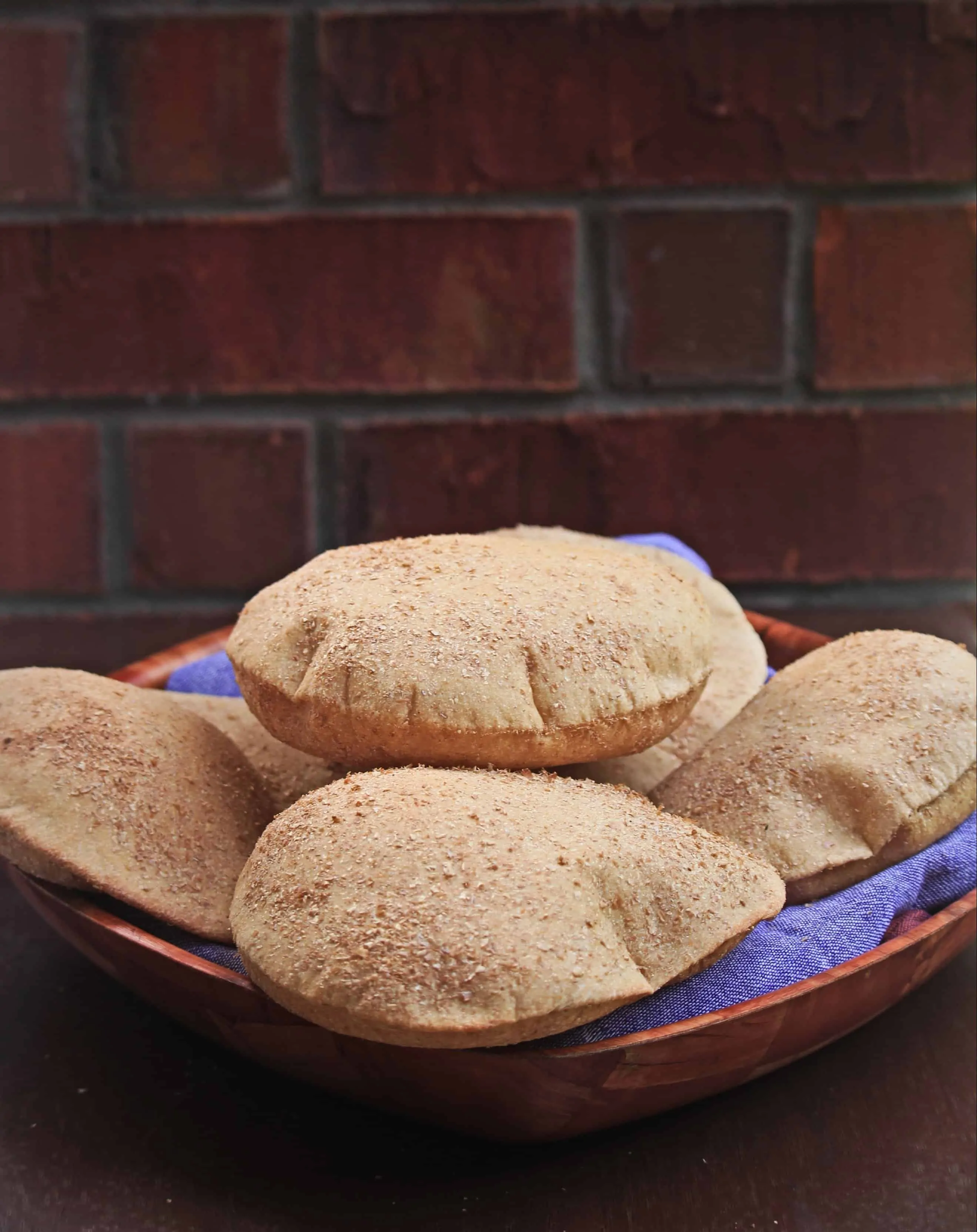 Aish baladi flatbread stacked in a plate