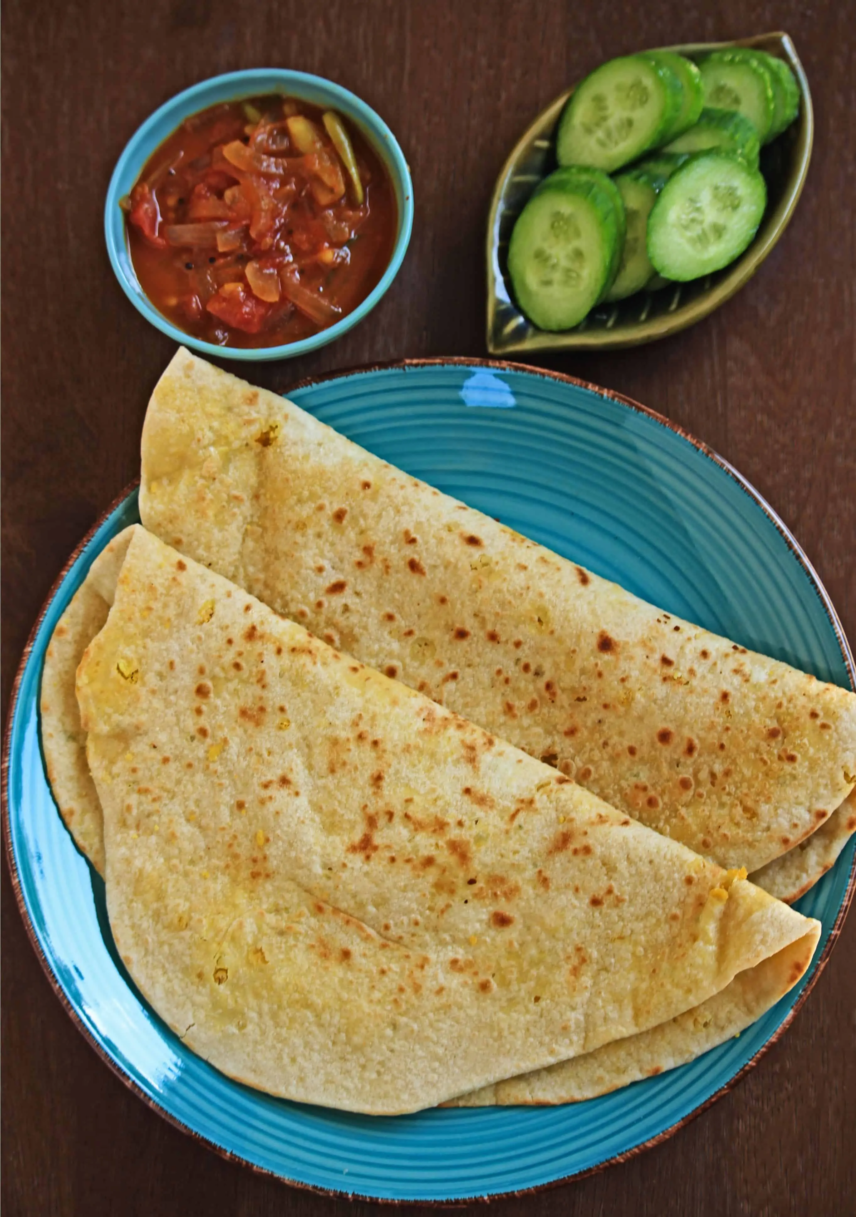 Dhal Puri in a blue plate with sides - Final Product