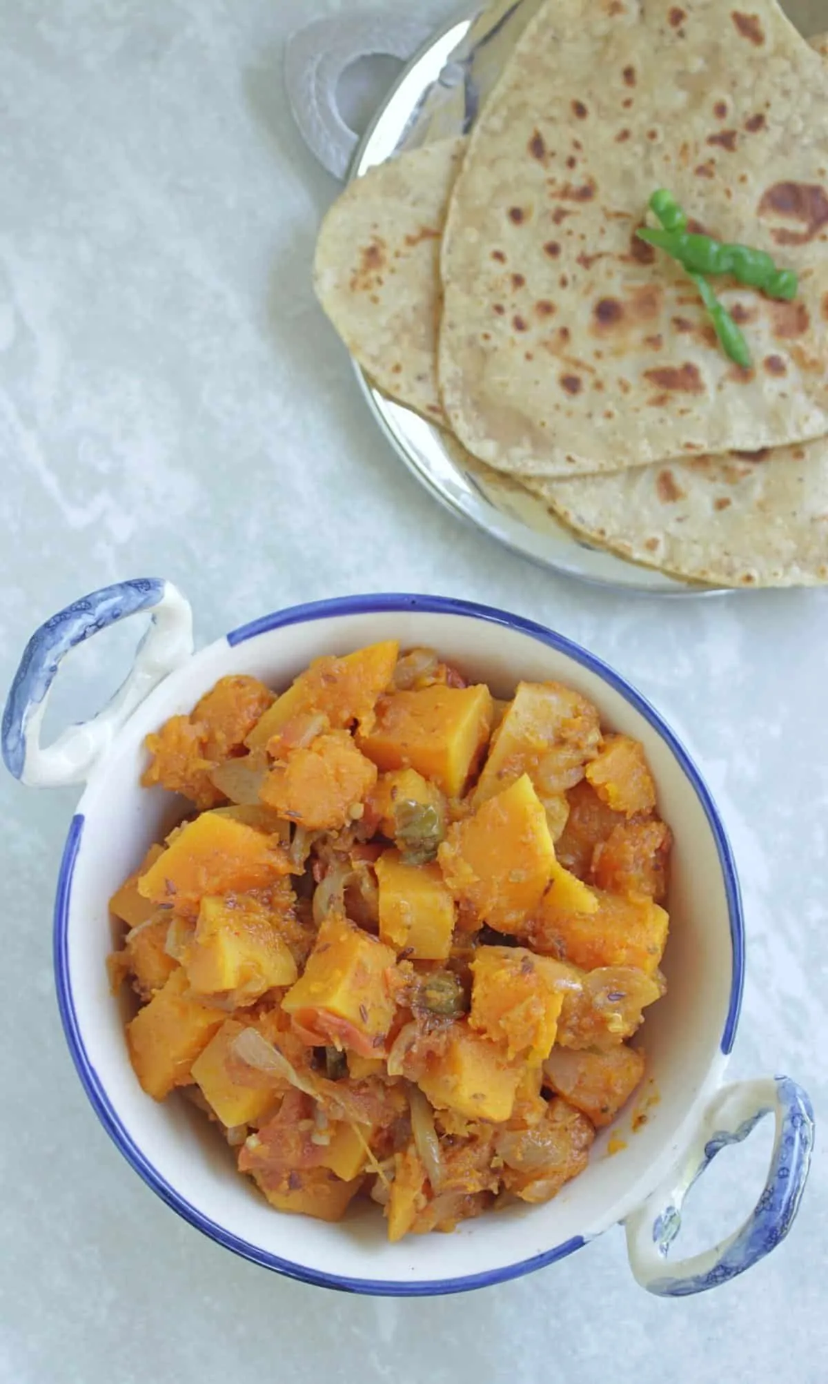 Pumpkin curry in a white bowl