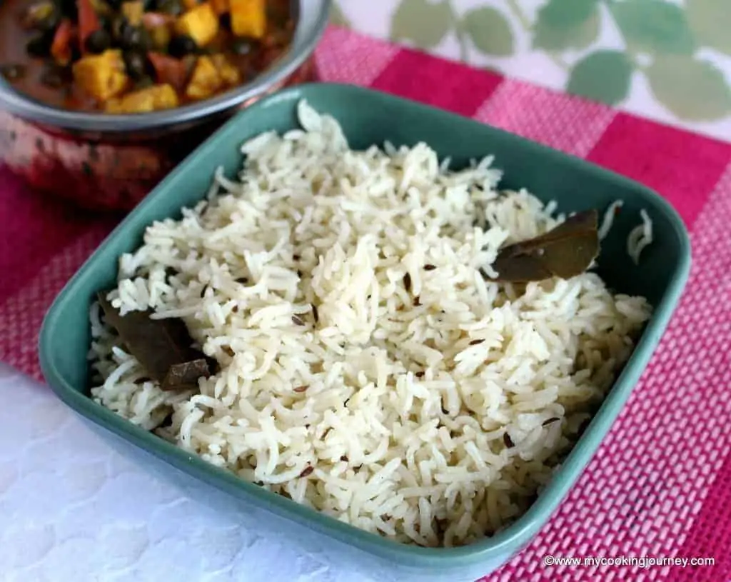 Jeera rice with subzi in the background