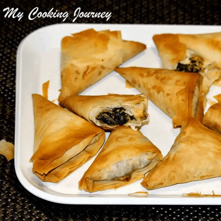 Spinach And Paneer Samosas in a tray