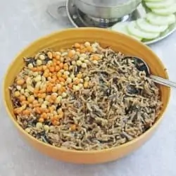 spinach rice in a bowl with spoon