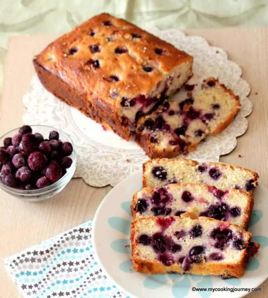 Lemon Blueberry Cake in a dish with berries