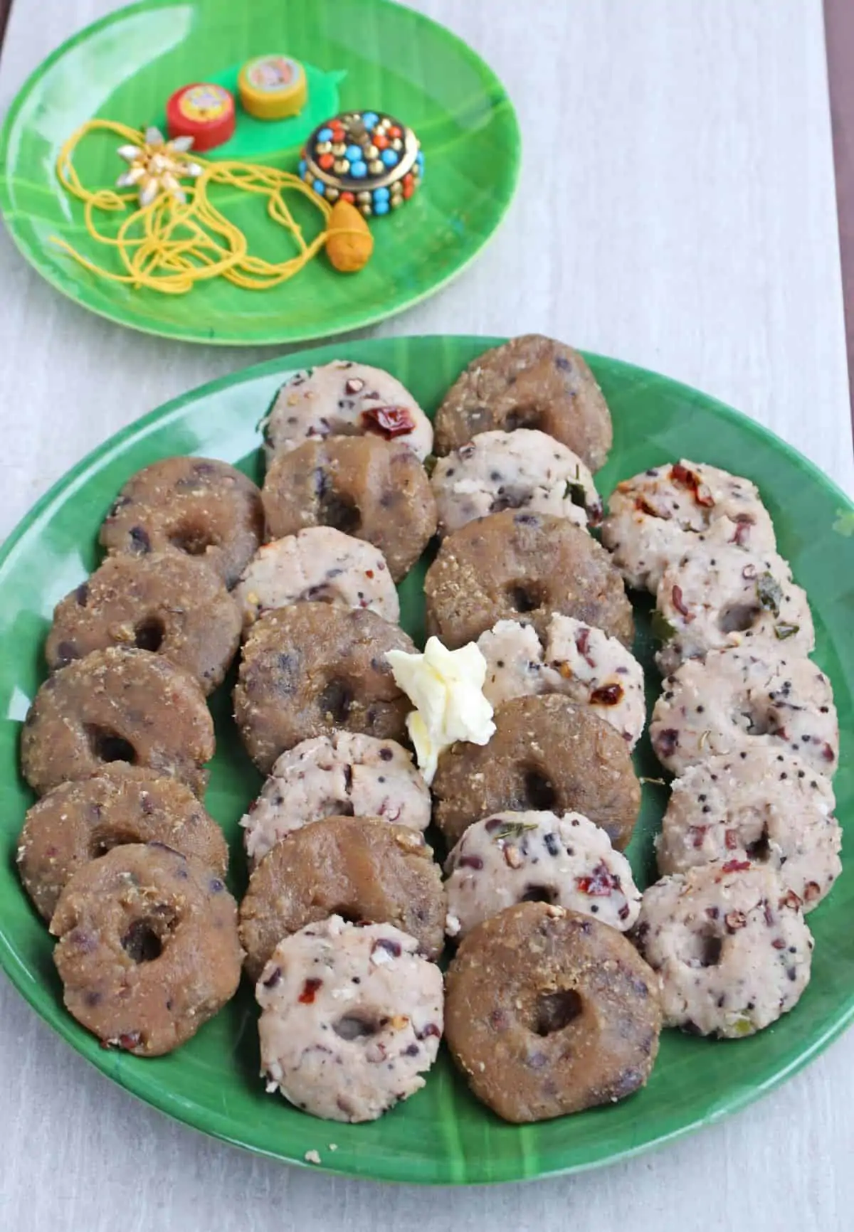 Karadayan Nombu sweet and salt adai with butter on top