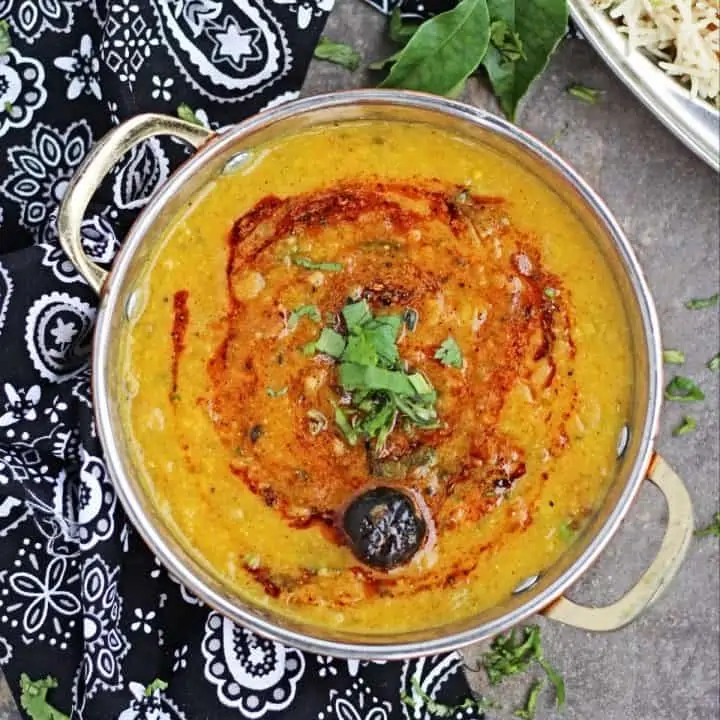 mango dal with seasoning on top