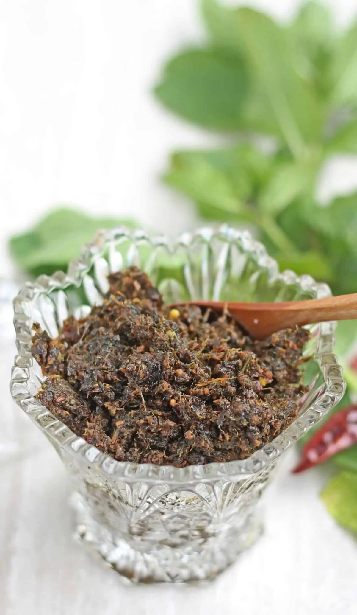 pudina thokku in a glass jar