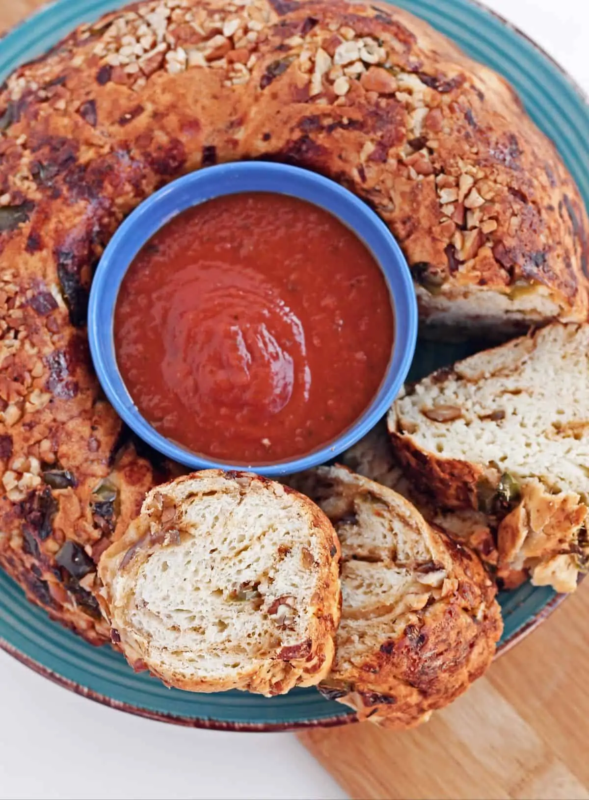 kugelhopf bread sliced and served with marinara sauce