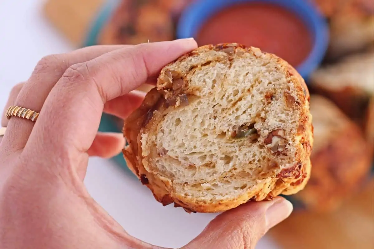 a slice of bread held in hand