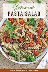 Pasta salad in a white bowl with text on top.