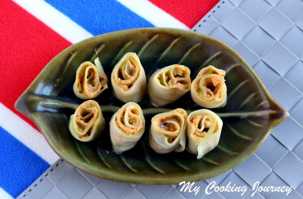 Cucumber Roll in a leaf designed bowl.