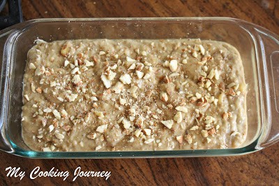 Baking Banana Almond Bread in loaf pan.