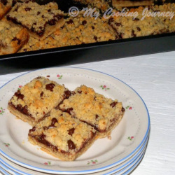 Chocolate Raspberry Walnut Bars beautifully served in a dish