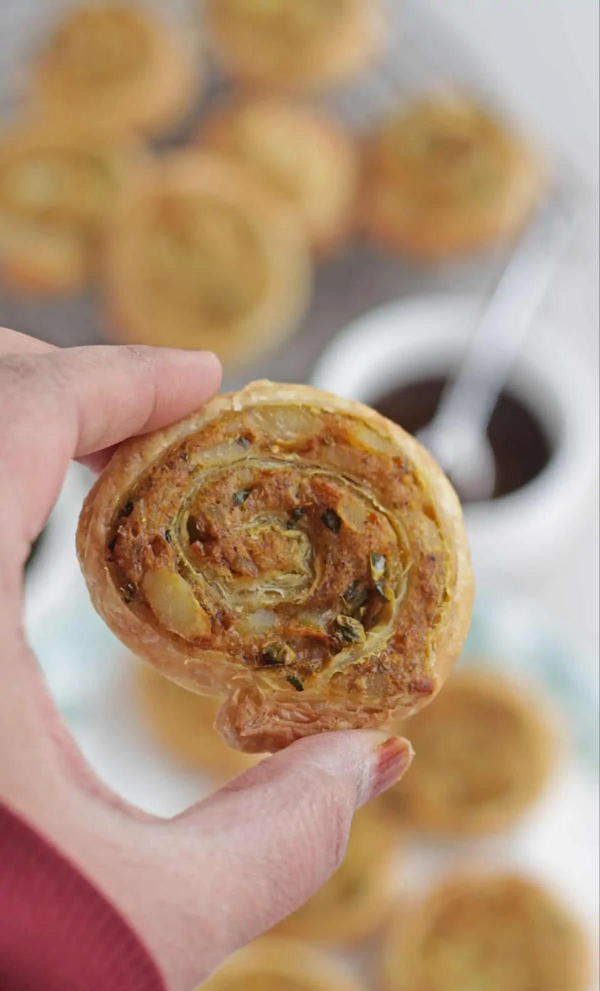 samosa pinwheel held in hand