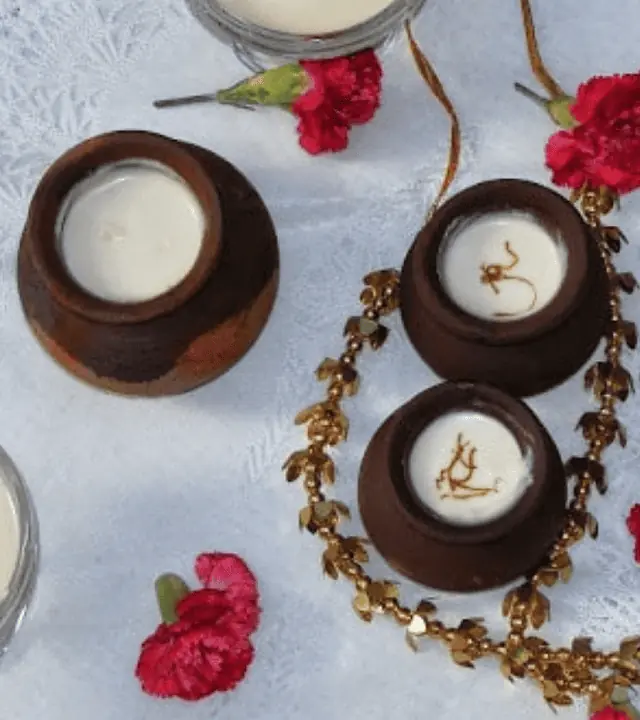 Mishti Doi in a mud pots with flowers.