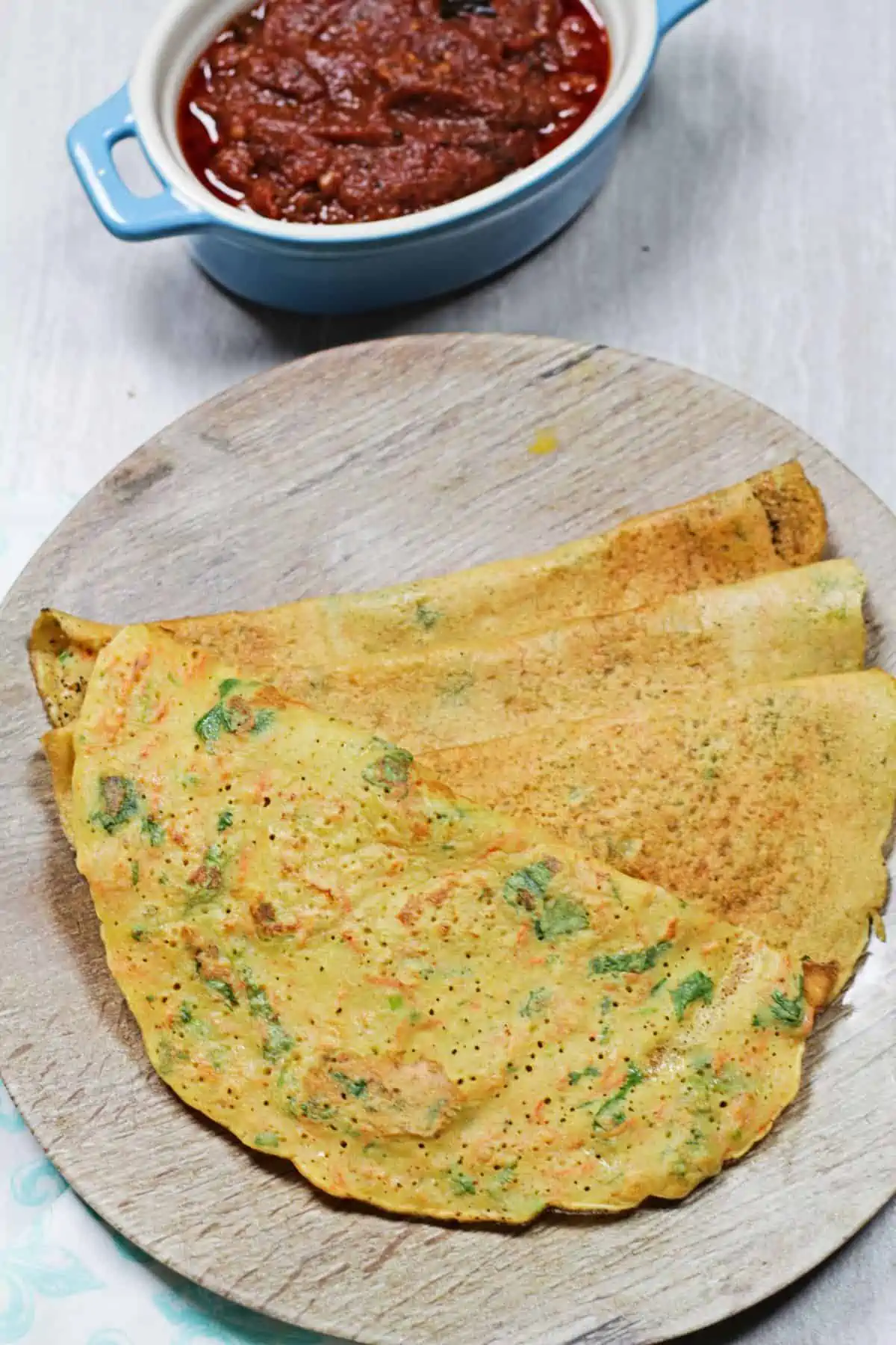 dosa with chutney in the background