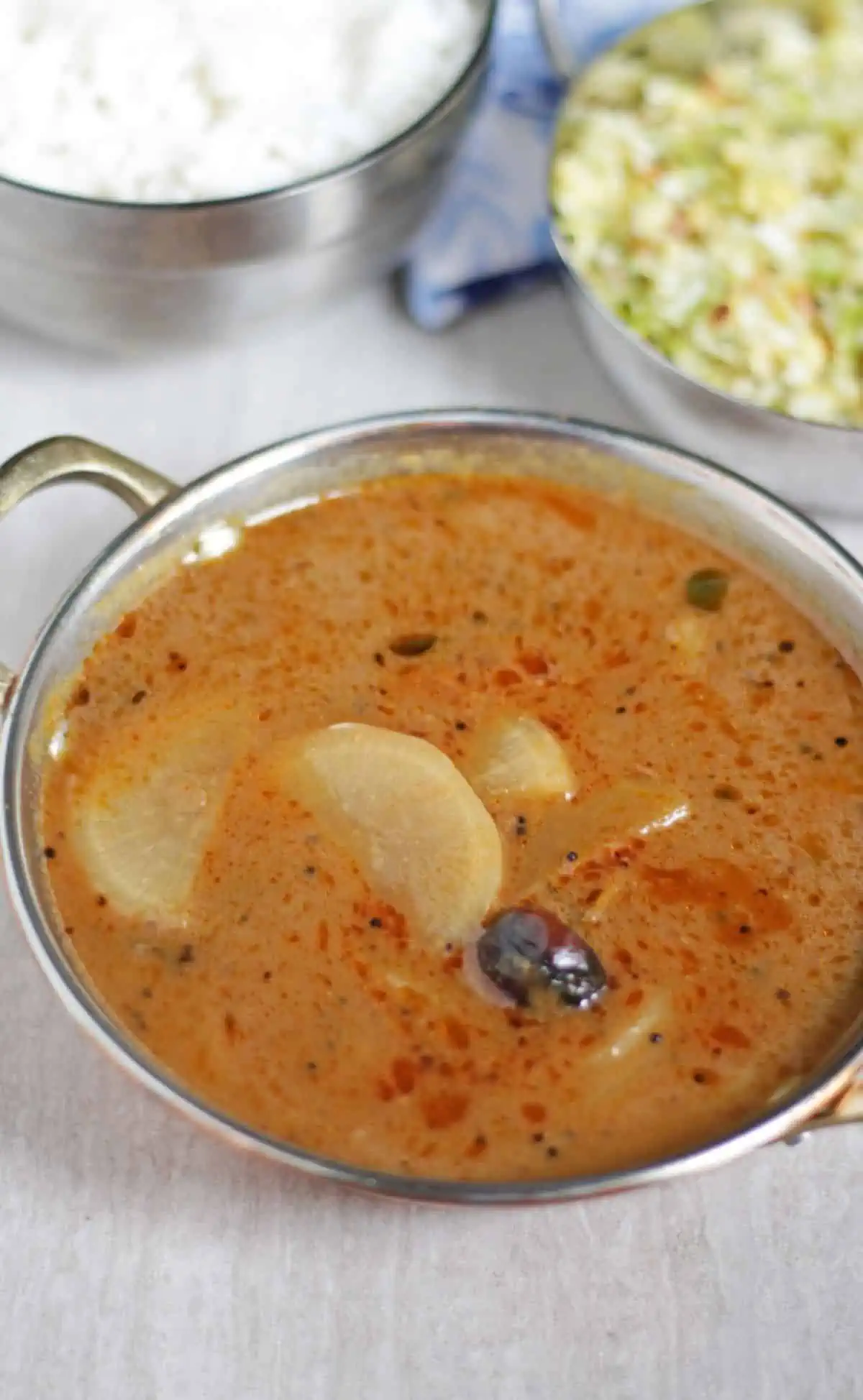 Radish vatha kuzhambu in a bowl.