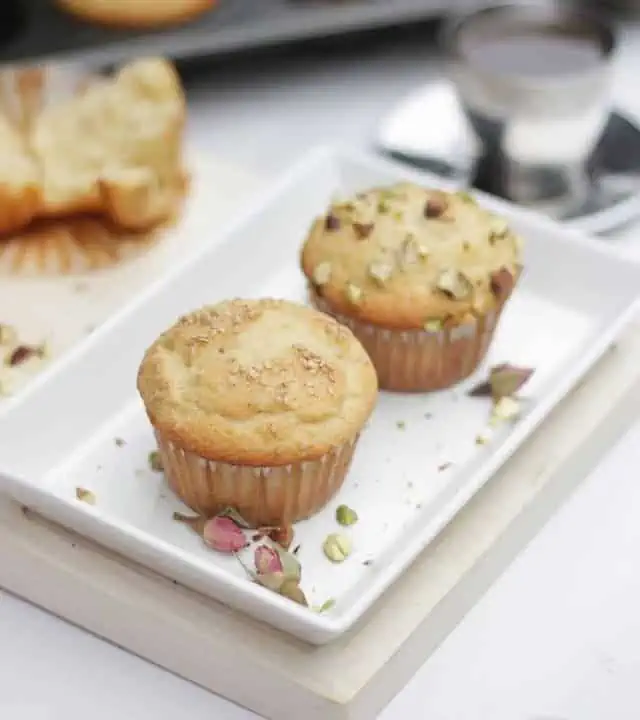 Two muffins in a plate.