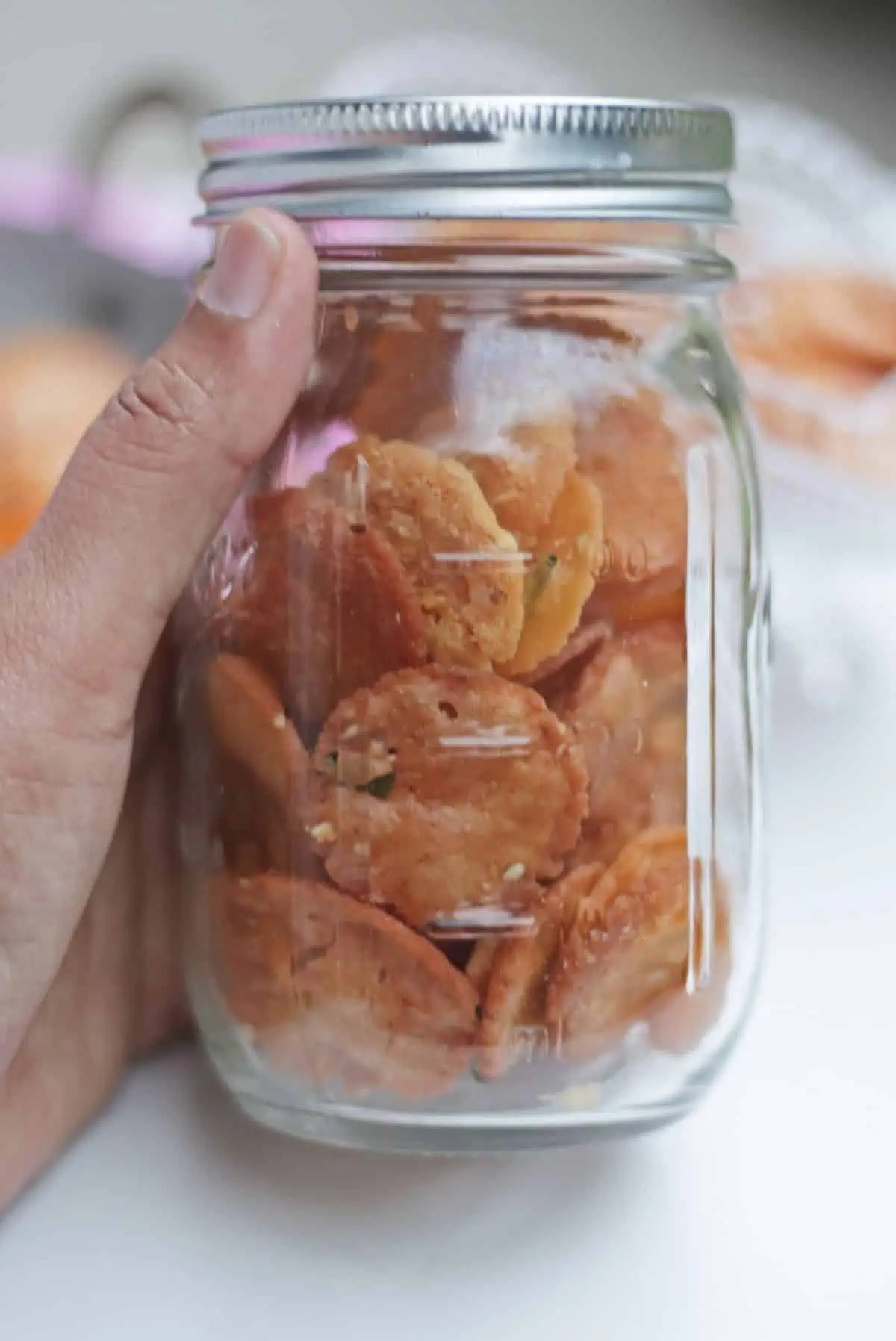 Mini thattai stored in a glass jar.