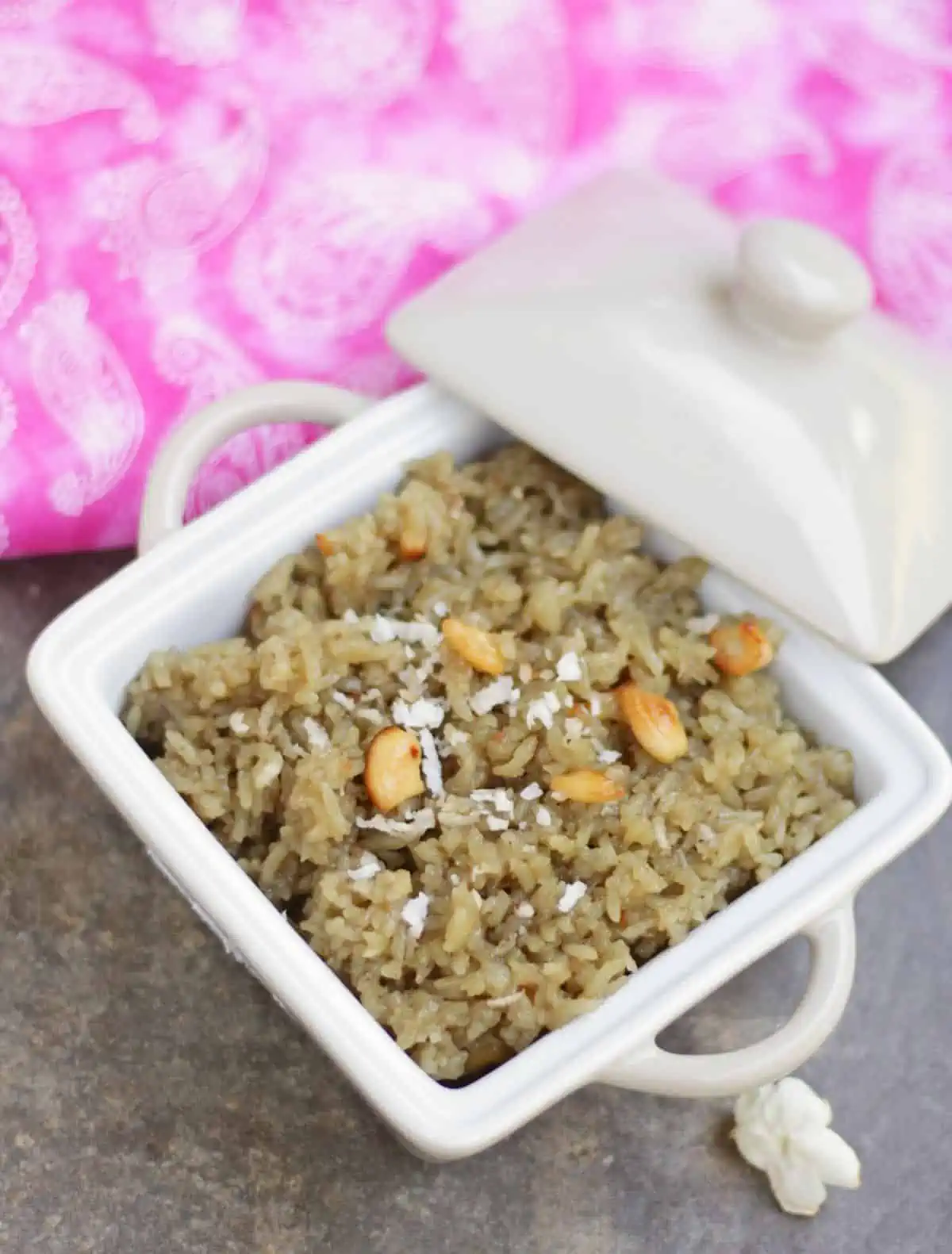 vellam sadam garnished with grated coconut and cashewnuts.