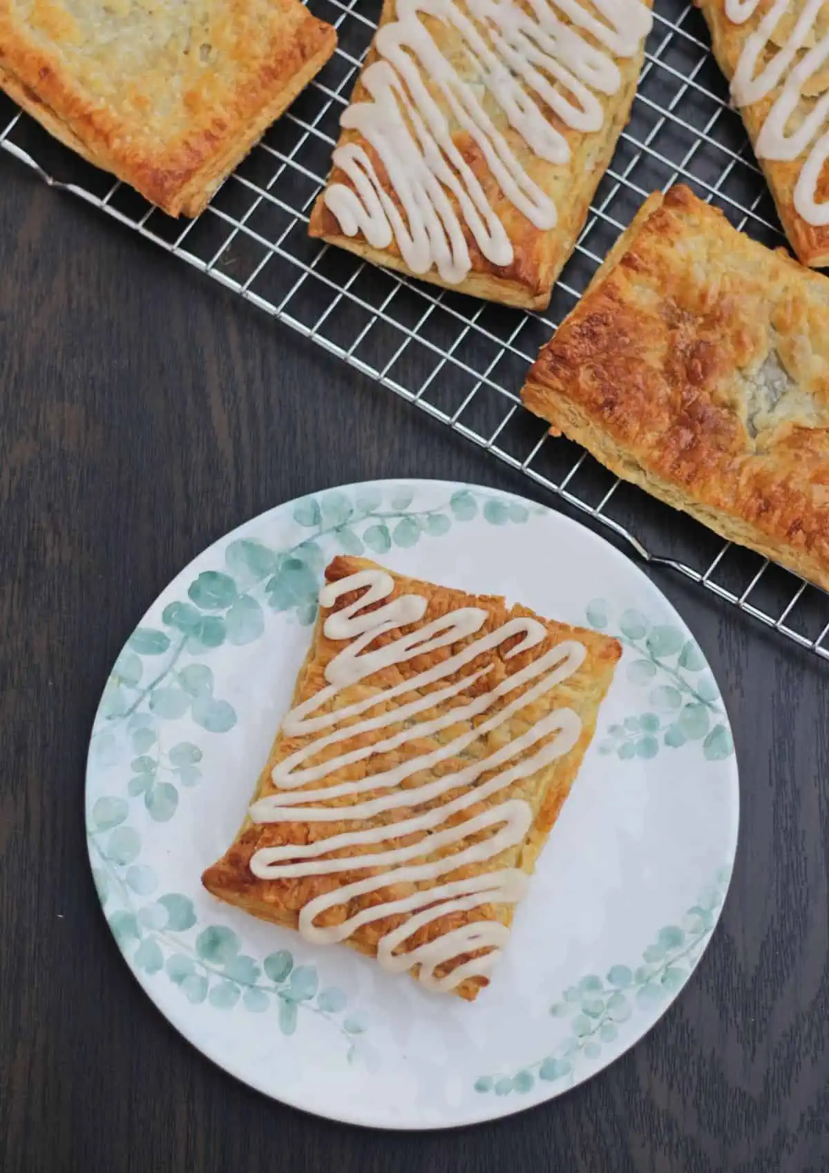 top view of toaster strudel in a plate and few others in a rack.