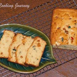 Fruit Cake on a rack and a plate - Feature Image