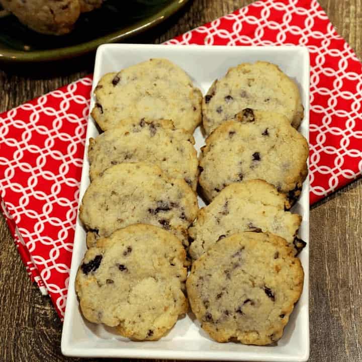 Orange Scented Cranberry Walnut Cookies in white tray - Feature Image