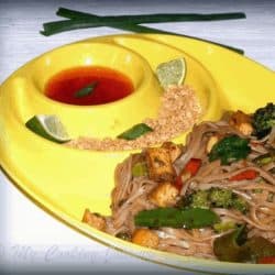 Pad Thai with crushed peanuts and sauce on the side - Feature Image
