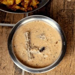 Iru Puli Kuzhambu in stainless bowl - Feature Image