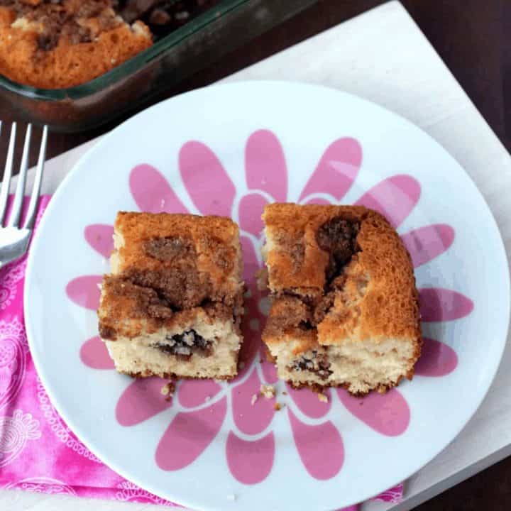 Cinnamon Crumb Coffee Cake in a decorative white plate - Feature Image