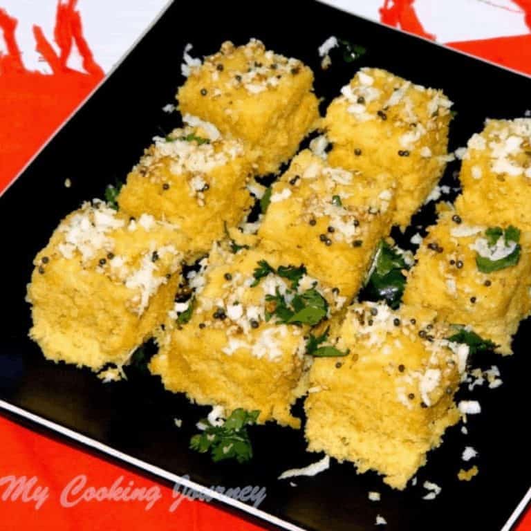 Khaman Dhokla in a black plate - Feature Image